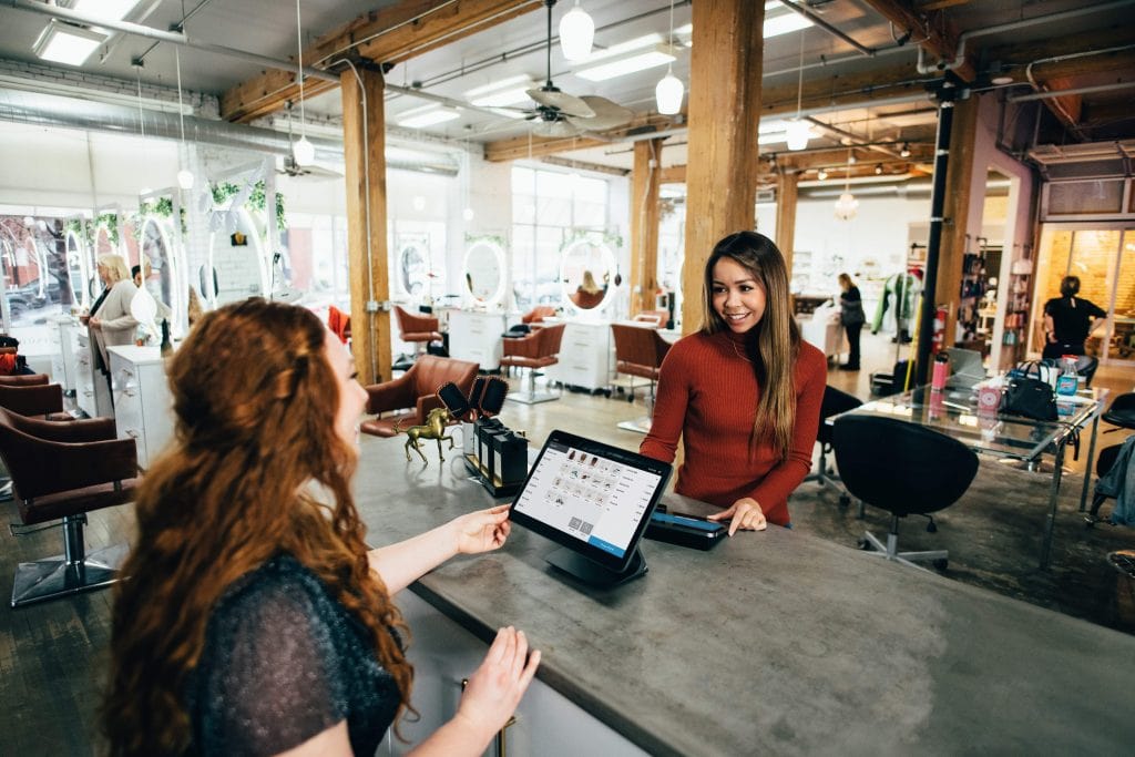 a customer service representative speaking to a client