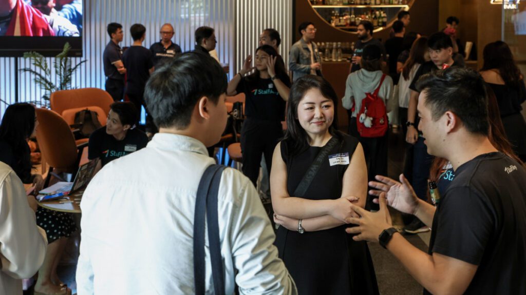 StaffAny HR Happy Hour July 2025 - GT Bar. Attendees mingling and networking with each other